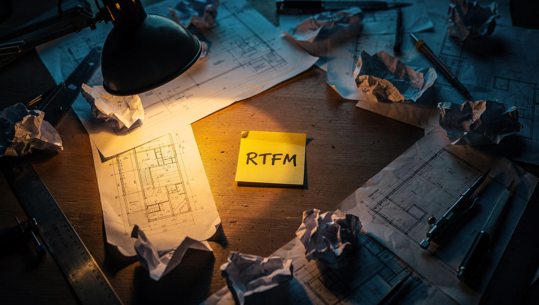 flux pro 2.0 An architect s drafting table viewed from above covered in crumpled blueprint pa 3